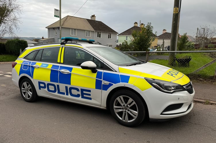 One of the police cars near the scene at Barnfield, Crediton.  AQ 7464
