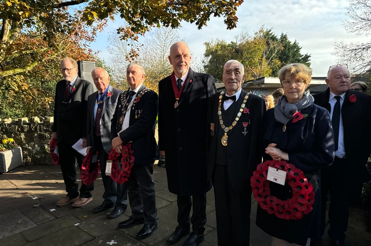 Councillors line up before laying wreaths, from left, Martin Binks, John Stevens, Mayor Guy Cochran, Deputy Mayor Steve Huxtable, Mid Devon Mayor Frank Letch and Cllr Natalia Letch.  AQ 7307
