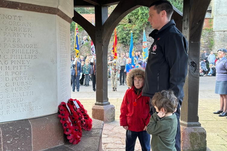The Fire Service wreath being placed on the War Memorial.  AQ 7347
