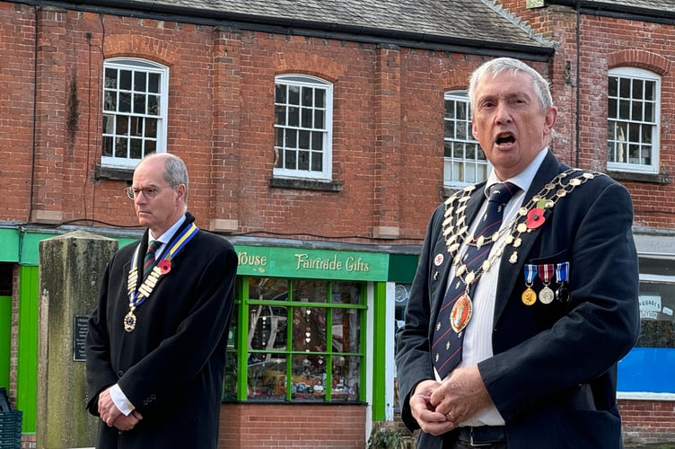 Henry Parker, Chairman, Crediton Royal British Legion and The Mayor of Crediton took the salute and the Mayor gave a speech.  AQ 7410
