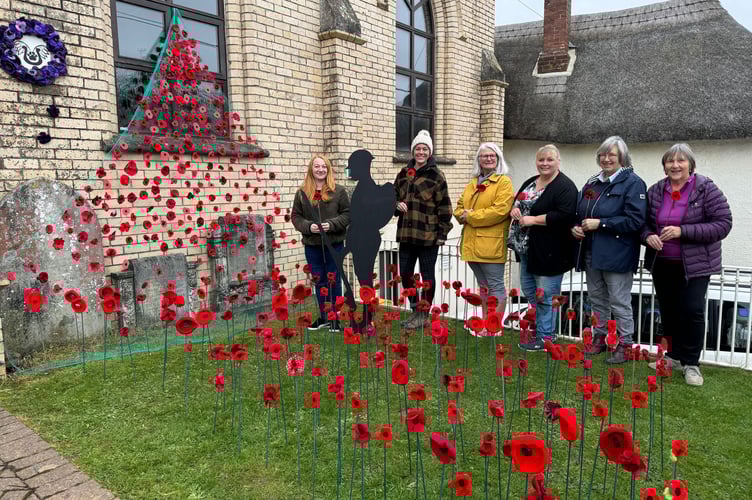 Some of those who made poppies for the Emmanuel Methodist Church display.  AQ 7198

