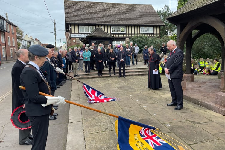Rev Matthew Tregenza and Cllr Czapiewski, right, with RBL and others gathered at war memorial on Union Road, Crediton
