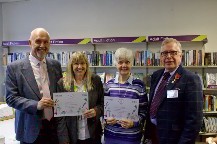 Sue Lee receiving the certificate for Crediton Library Community Garden and Jenny Berg and Philip Hutchens receiving the certificate for Age Concern Crediton from Deputy Mayor Steve Huxtable.
