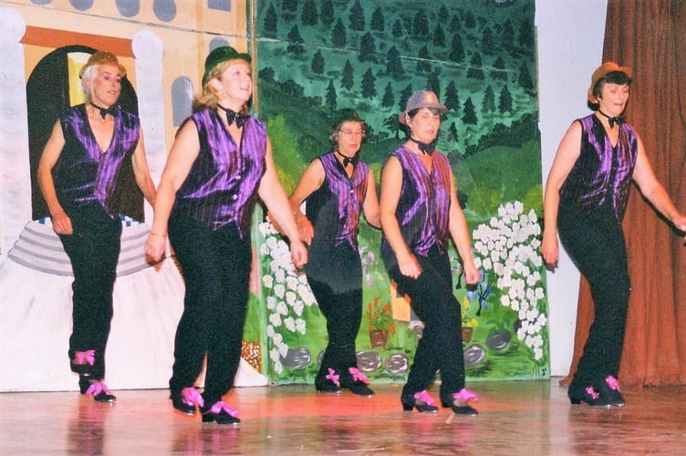 Sue Read tap dancing, back left.