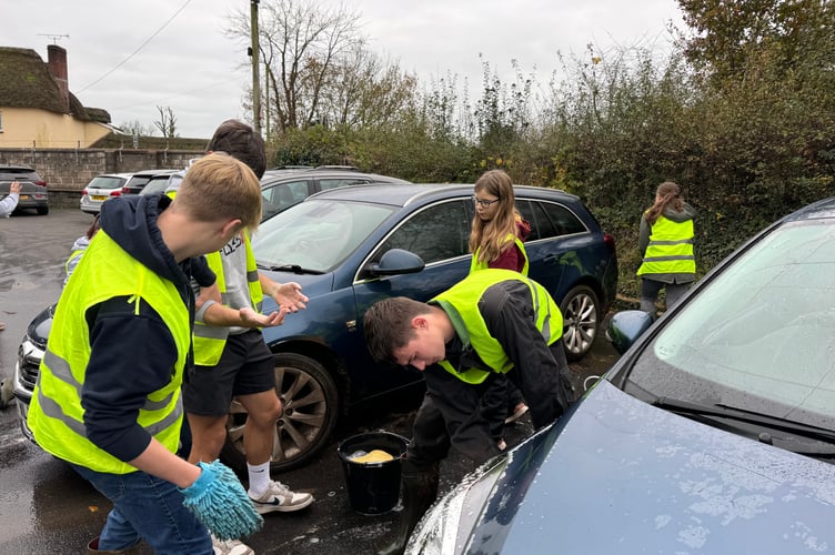 Busy washing cars for Children in Need. AQ 7804