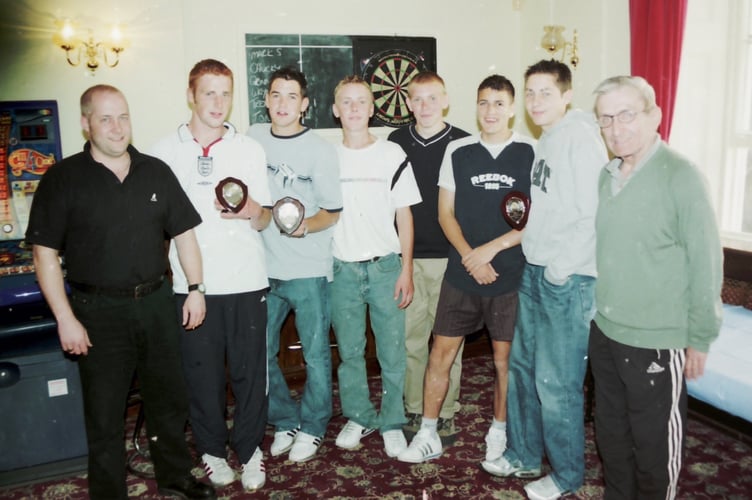 Trophy winners of the Ship Hotel football team in September 2003. DSC00481