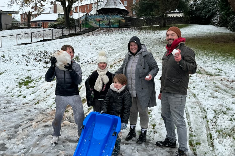A Crediton family enjoyed sledging and snowball fights in Newcombes Meadow in Crediton. AQ 8146