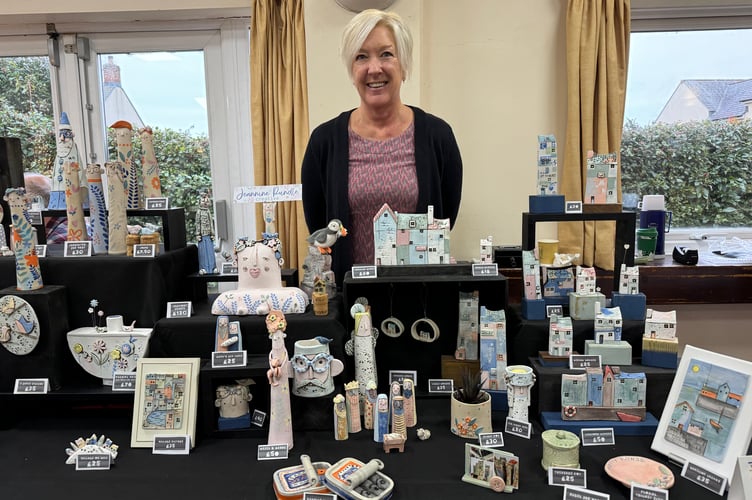 Jeannine Rundle of Cheriton Fitzpaine makes wonderful ceramics, many on display at Sandford Craft Fair.  AQ 7853
