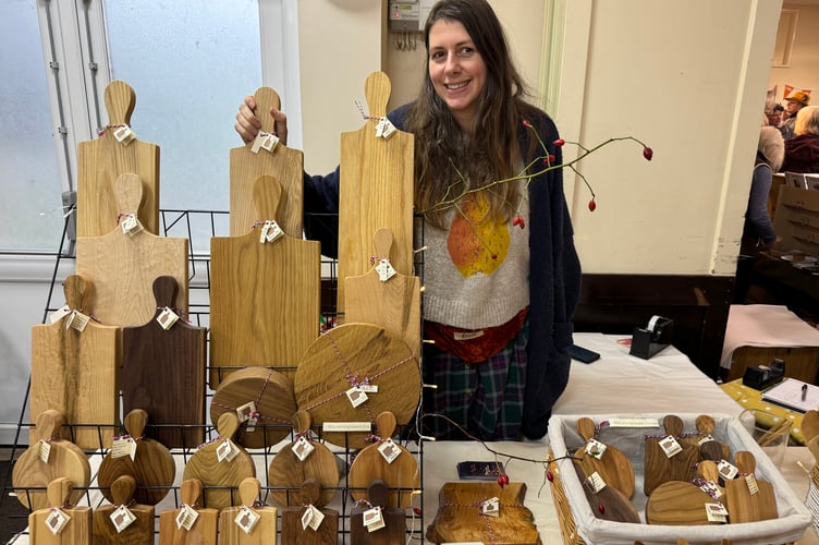 Rosie Brewer,  makes serving boards and cooking utensils and sold many items at Sandford Craft Fair.  AQ 7826

