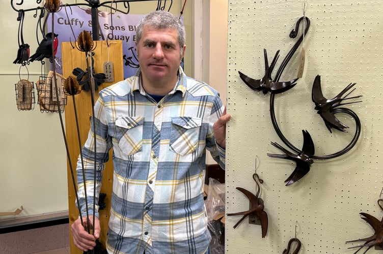 Aaron of Cuffy and Sons Blacksmiths took along items including garden accessories and decorations from the family business which is run from Exeter Quay. AQ 7870