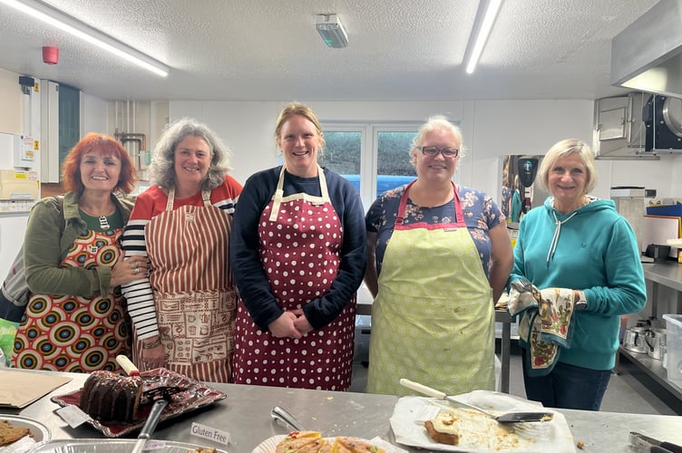 Bindy Saywood, organiser, Sandford Craft Fair, left and the Friends of Sandford School kitchen team which worked hard at the craft fair.

