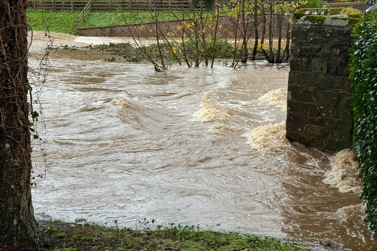 The river Yeo is at bursting point at Fordton, Crediton due to Storm Bert.  AQ 8528
