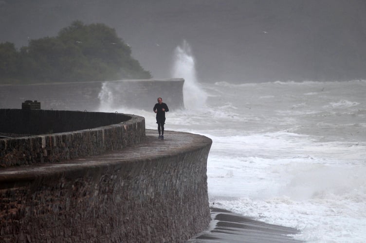 Storm Bert. Waves batter the sea wall walk at Teignmouth