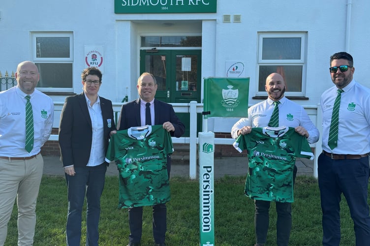 Persimmon representatives with Sidmouth RFC members marking a three-year sponsorship.

