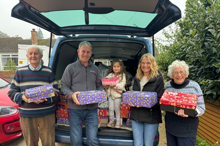 Shoeboxes loaded, from left, Derek Shapland, Biffo Holland, Poppy (4), Jan Holland and Margaret Tucker. AQ 7081