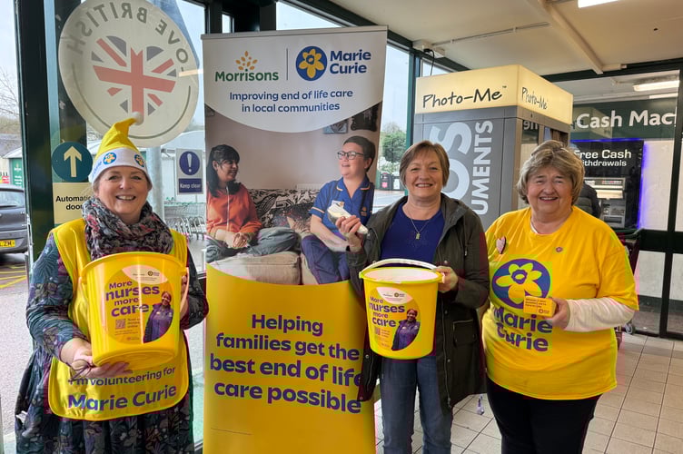 Collecting for Marie Curie, from left, Jenny Evans, Gill Pearn (Chair, Crediton Friends Group, Marie Curie) and Crediton Morrisons Community Champion Hazel Evely. AQ 8742