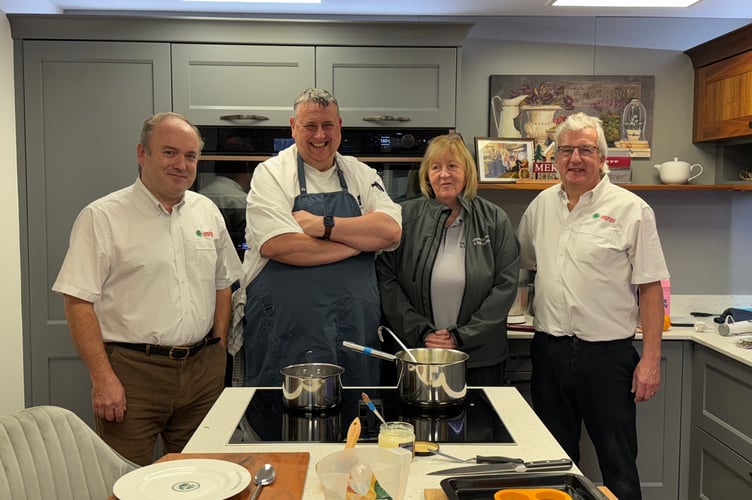 Richard Hunt, second left, chef, with some of the Ashgrove Kitchens staff there to welcome visitors to its Seasonal Showroom event. 8748