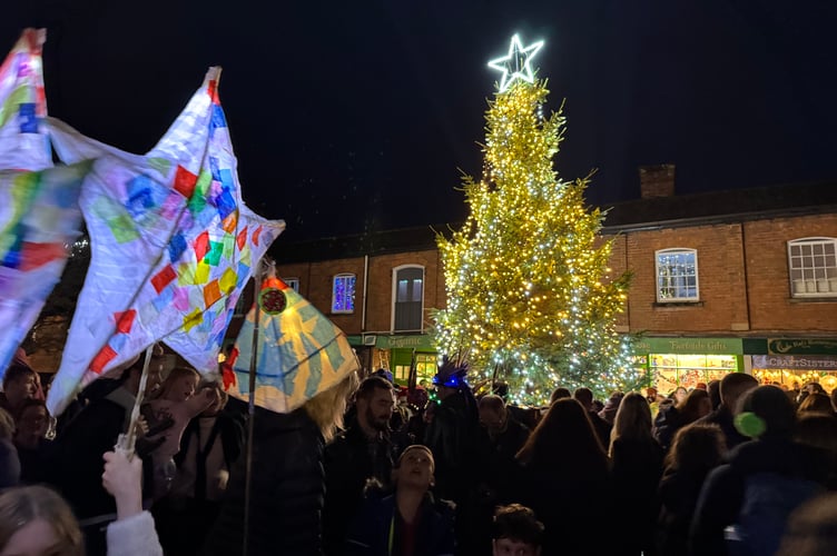 Lanterns and the lit tree in the town square.  AQ 8999