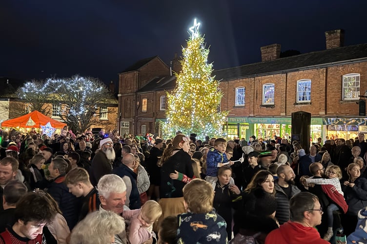 The lit tree in Crediton Town Square.  AQ 8991
