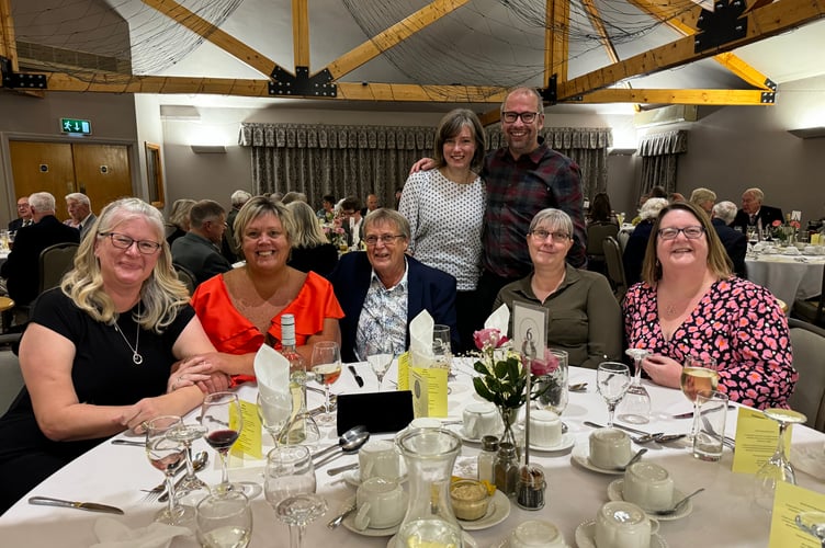 Band members at the anniversary dinner. AQ 7718