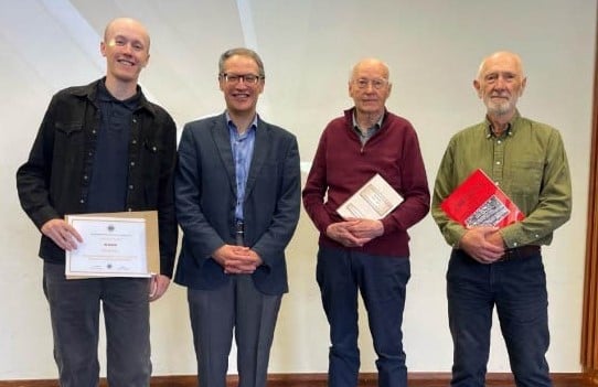 Tony Gale (right) with other winners and Devon History Society President, Prof. Henry French at the awards ceremony
