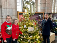 Crediton Courier decorates tree for Christmas Tree Festival