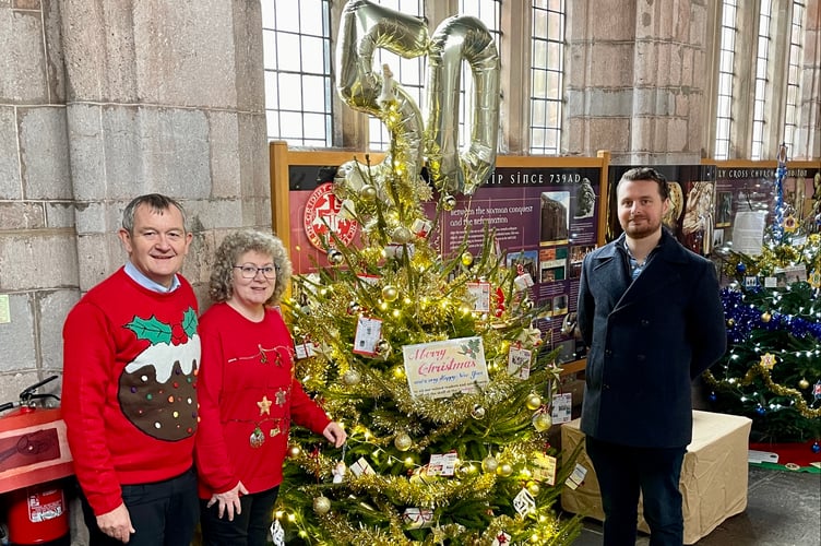 Alan Quick, Carol Furze and Will Goddard with the Crediton Courier's tree