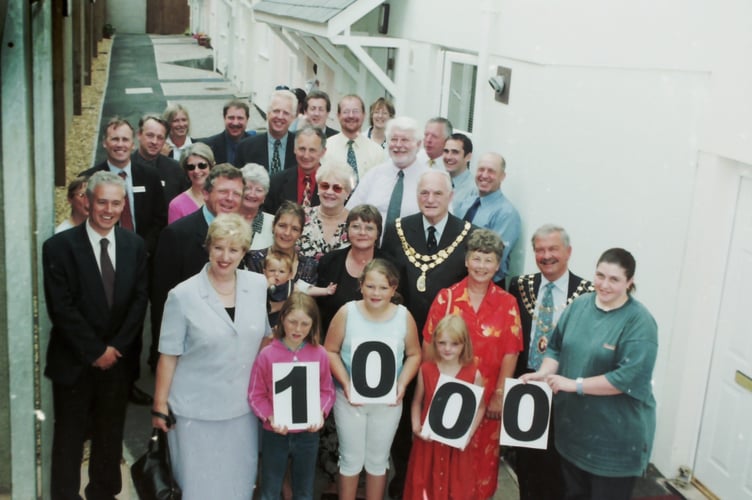 Marking the 1,000th development by Signpost Housing. New residents were among those at the opening of Moore Court in Crediton in July 2002 DSC01048