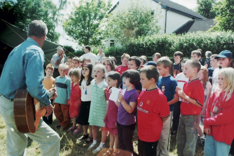 Copplestone School children sang at Coldridge Fete in July 2002. DSC01077
