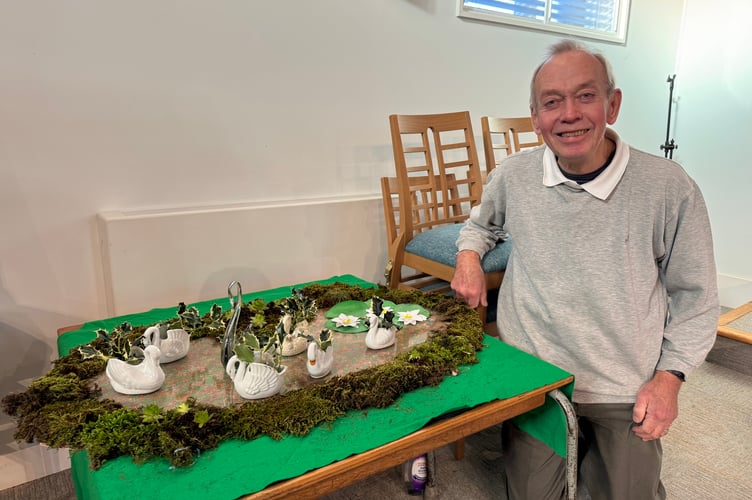 John Ashley with Swans a Swimming.  AQ 9884
