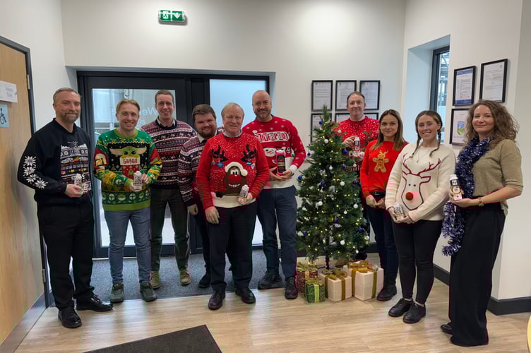 The Crediton Dairy staff in their Christmas jumpers. AQ 9731