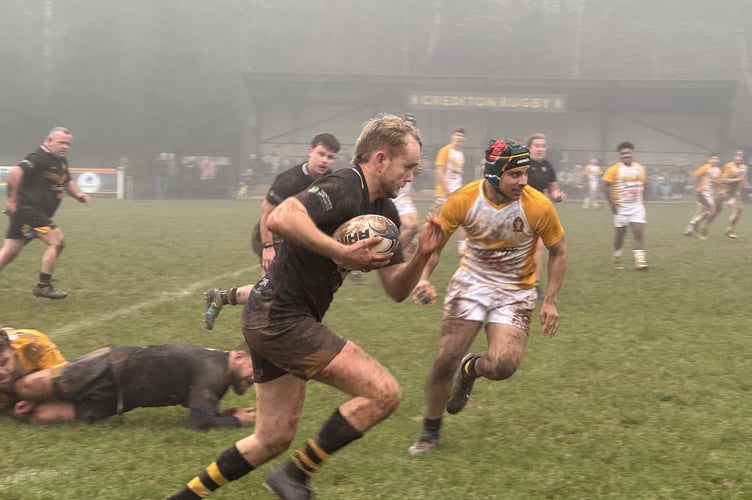 Running for the line with the ball