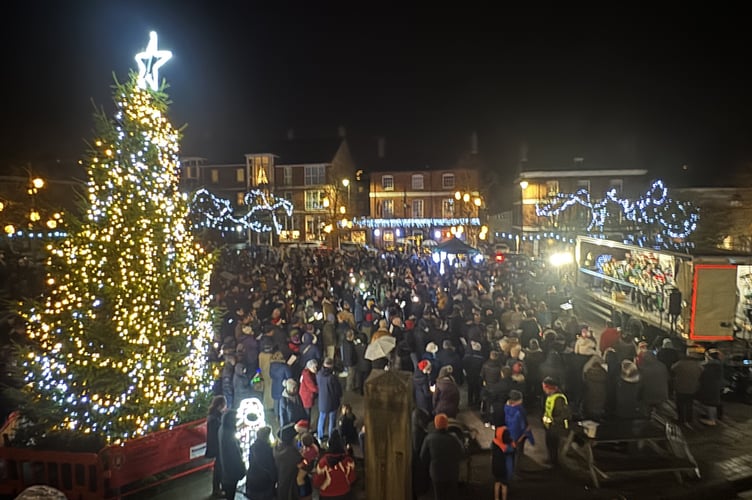 A view looking down on the tree, crowd and town band on the lorry which acted as a stage
