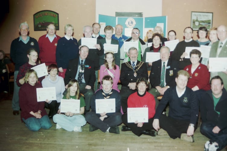 Crediton Lions Club presentation of cheques in February 2004 following the 2003 carnival. DSC01023