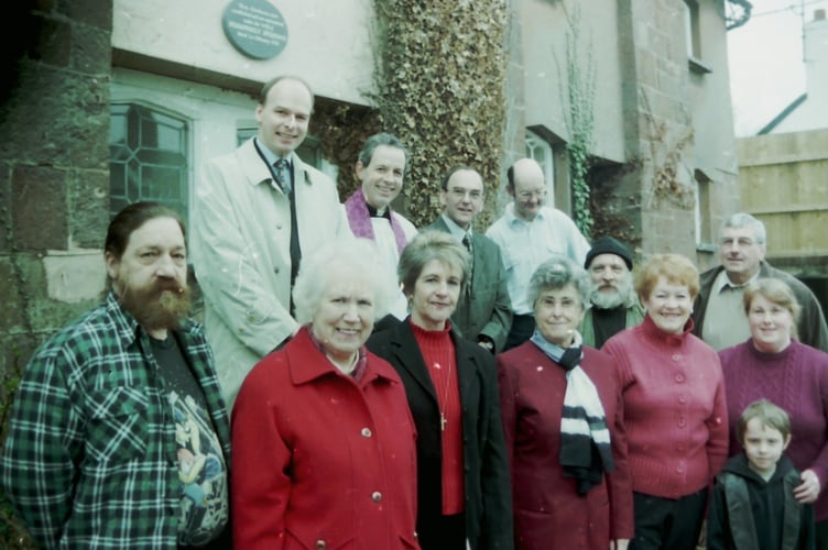Trustees and residents at the dedication of Old Spurways almshouses in Crediton in March 2004. DSC01147