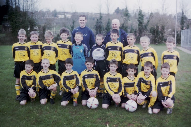 Crediton Youth FC Under 9s received new kit sponsored by R J Brooks and Son in March 2004. DSC01137