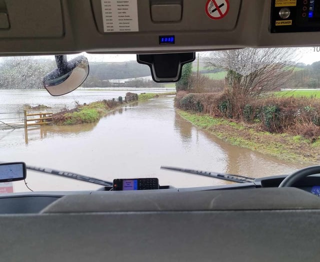 Dramatic boat rescue for couple from vehicle in floodwater