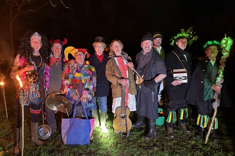 The Brown Paper Bag Theatre Company who staged the Mummer’s Play, pictured with some of the members of Exeter Morris.  AQ 2084

