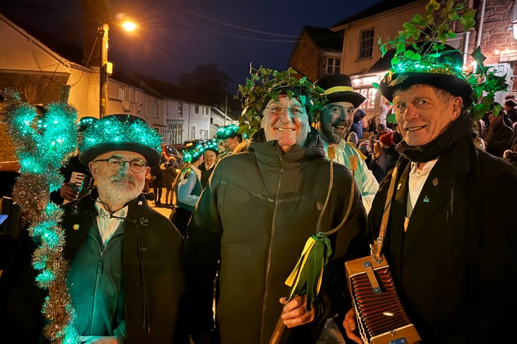 Richard Gardener of Pinhoe, Exeter, centre, was crowned the Wassail King at Sandford, pictured with members of Exeter Morris. AQ 2012
