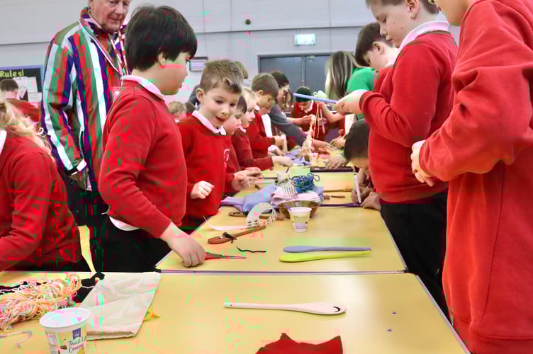 Decorating wooden spoons for the new sensory room, in honour of children's charity Wooden Spoon which provided most of the funding