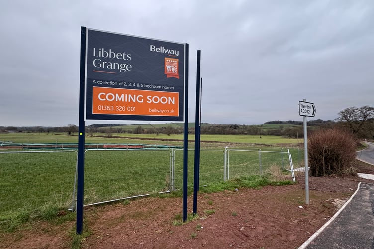 The land under the sign where Crediton Rugby Club pitches will be located at Libbets Grange.  AQ 3403