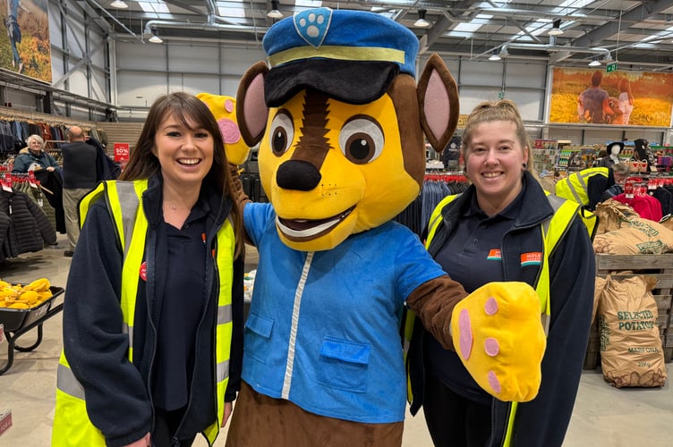 Mole Avon staff with Chase from Paw Patrol during the Pet Weekend.  AQ 3129
