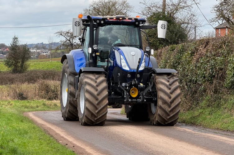 One of the tractors making its way from the farm at the start of the run. AQ 3307