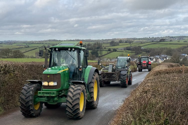 Some of the tractors after leaving Cheriton Fitzpaine. AQ 3356