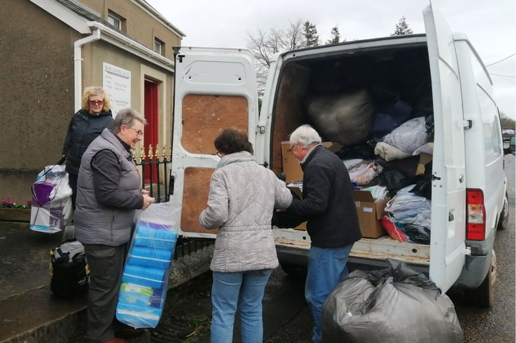 Filling a Ford Transit van with donations at Bow Gospel Hall