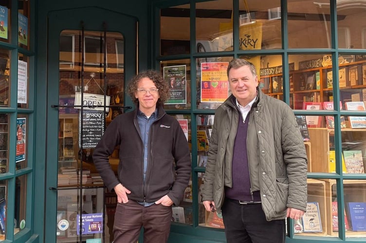 Bookshop Manager Carl East, left, with Mel Stride MP