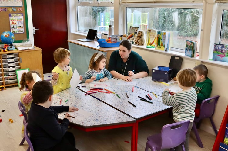 12 February 2025 Early Worlies Nursery grand opening Children learning to write their names (Will Goddard, Crediton Courier)