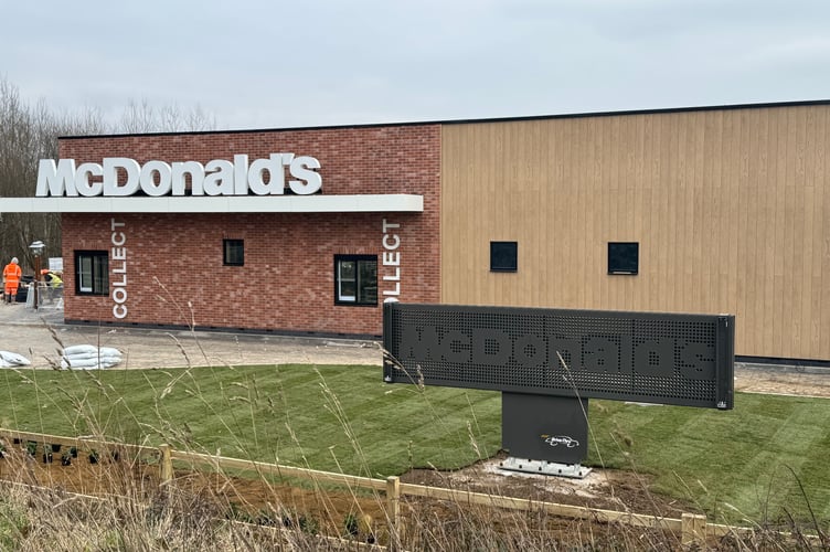 The McDonald’s sign on the side of the Crediton restaurant and drive-thru.  AQ 4013
