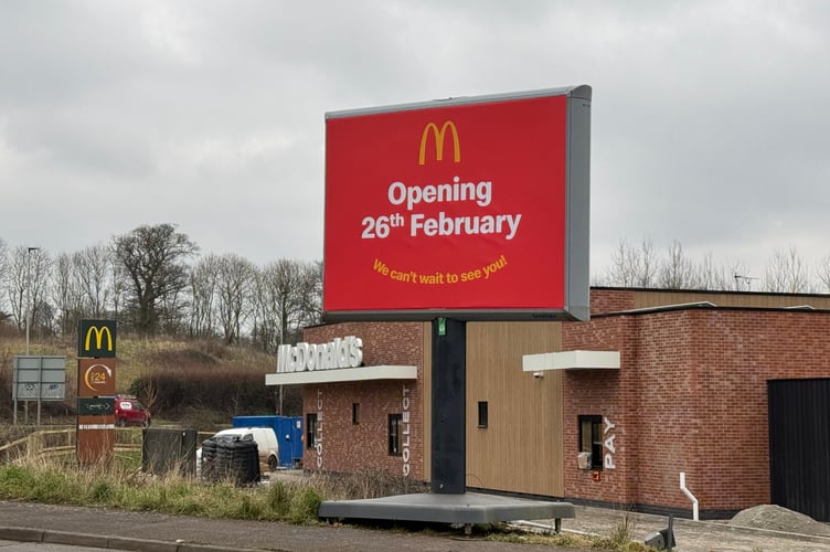 The sign confirming the opening date of Crediton McDonald’s. AQ 4133