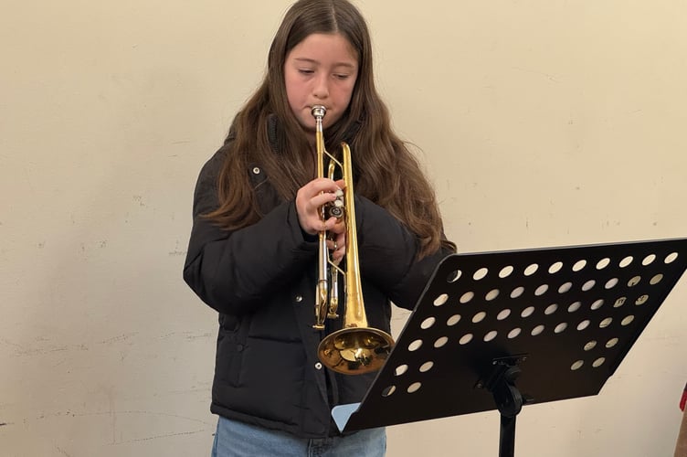Crediton Youth Orchestra member Lucy Morgan (11), played during the Seed Share.  AQ 4412
